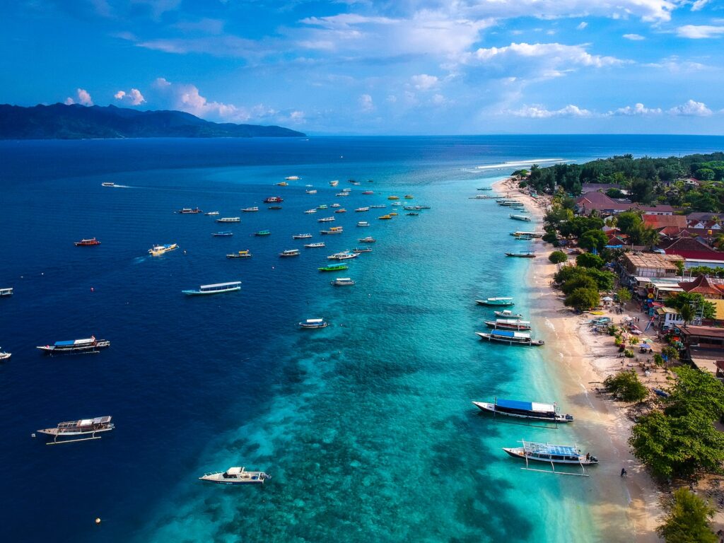 aerial view of boats on sea during daytime