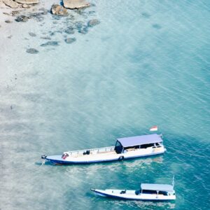 two motor boat on body of water at daytime