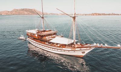 a large boat floating on top of a body of water